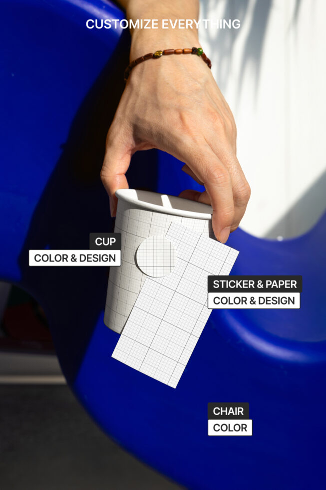 Hand holding paper cup with editable grid layout sticker papers below