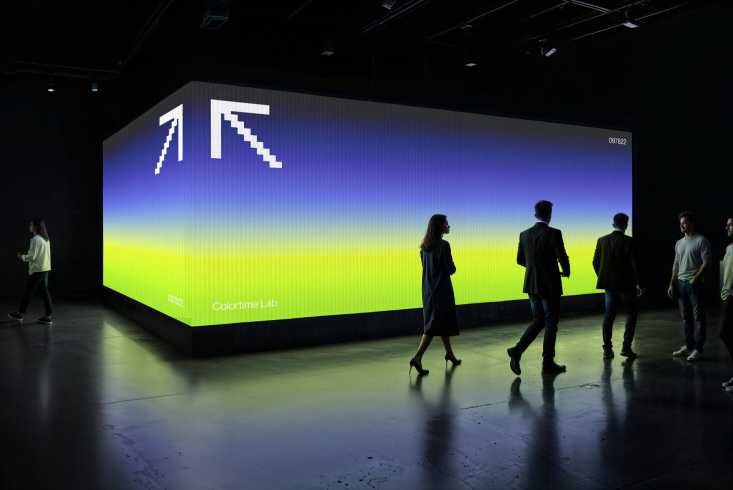 Large LED display showing blue to yellow gradient with pixelated arrows logo