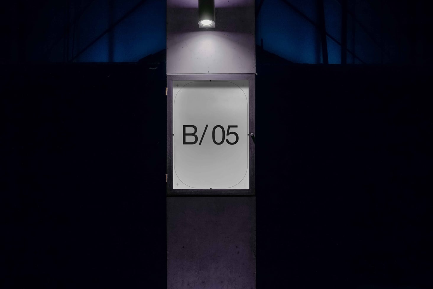 Blue-toned wall fixture with lit ceiling lamp, screen showing B/05 text