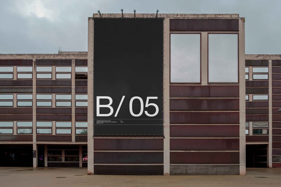 Black billboard mockup displaying B/05 on concrete brutalist architecture
