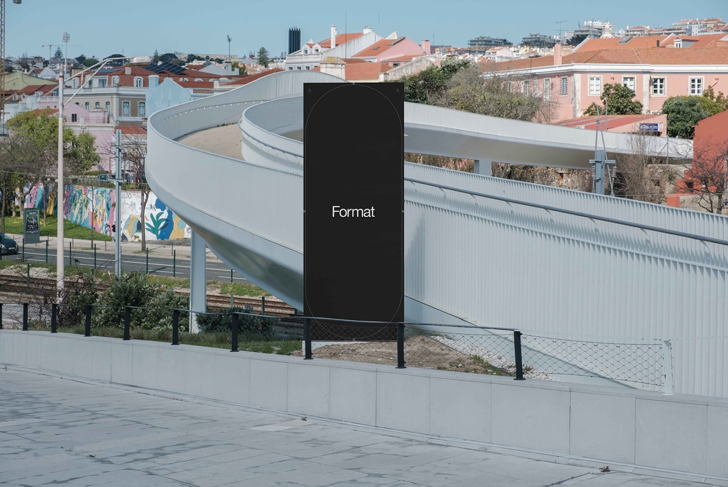 Tall rounded vertical sign mockup with Format text in modern plaza setting