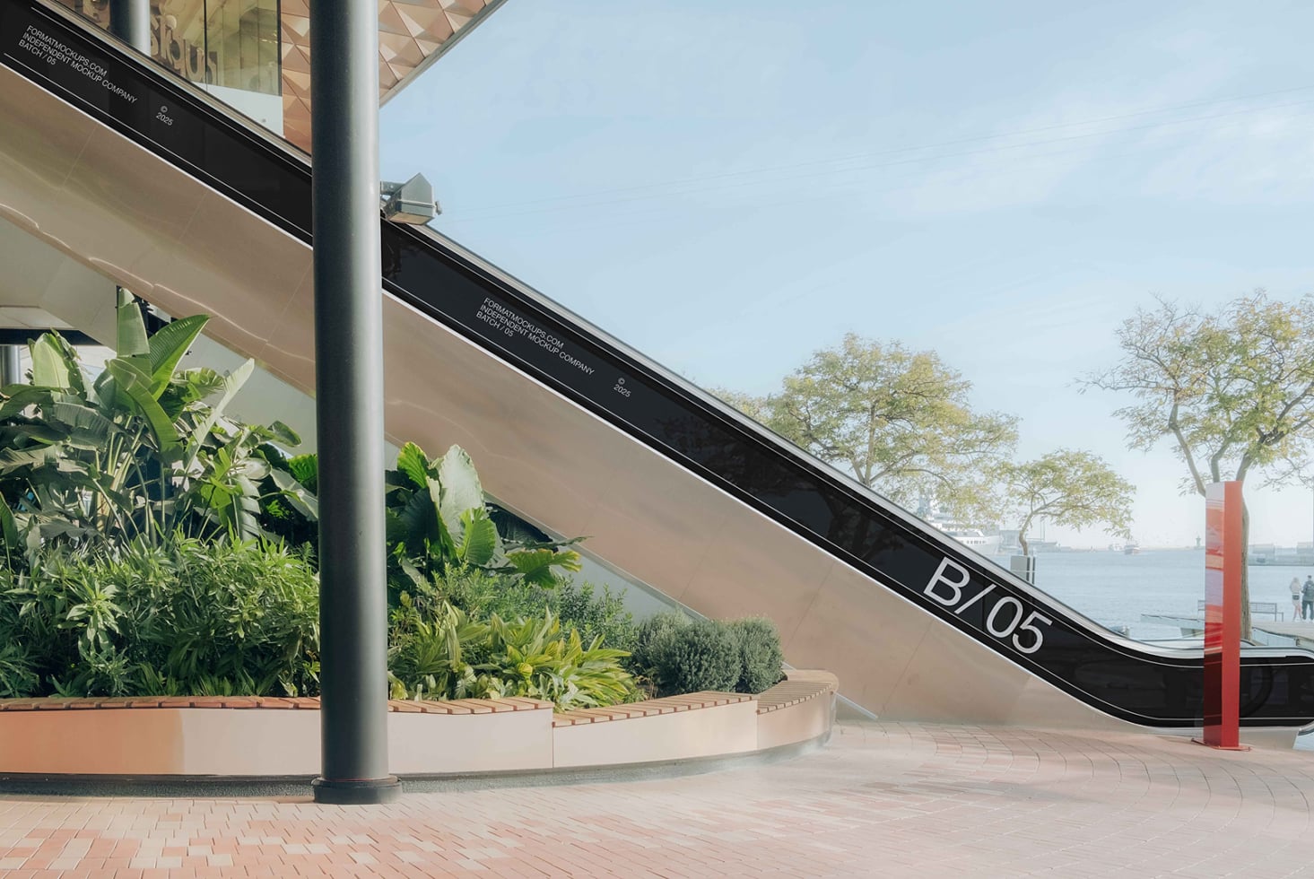 Black diagonal banner mockup on curved modern building with ocean view