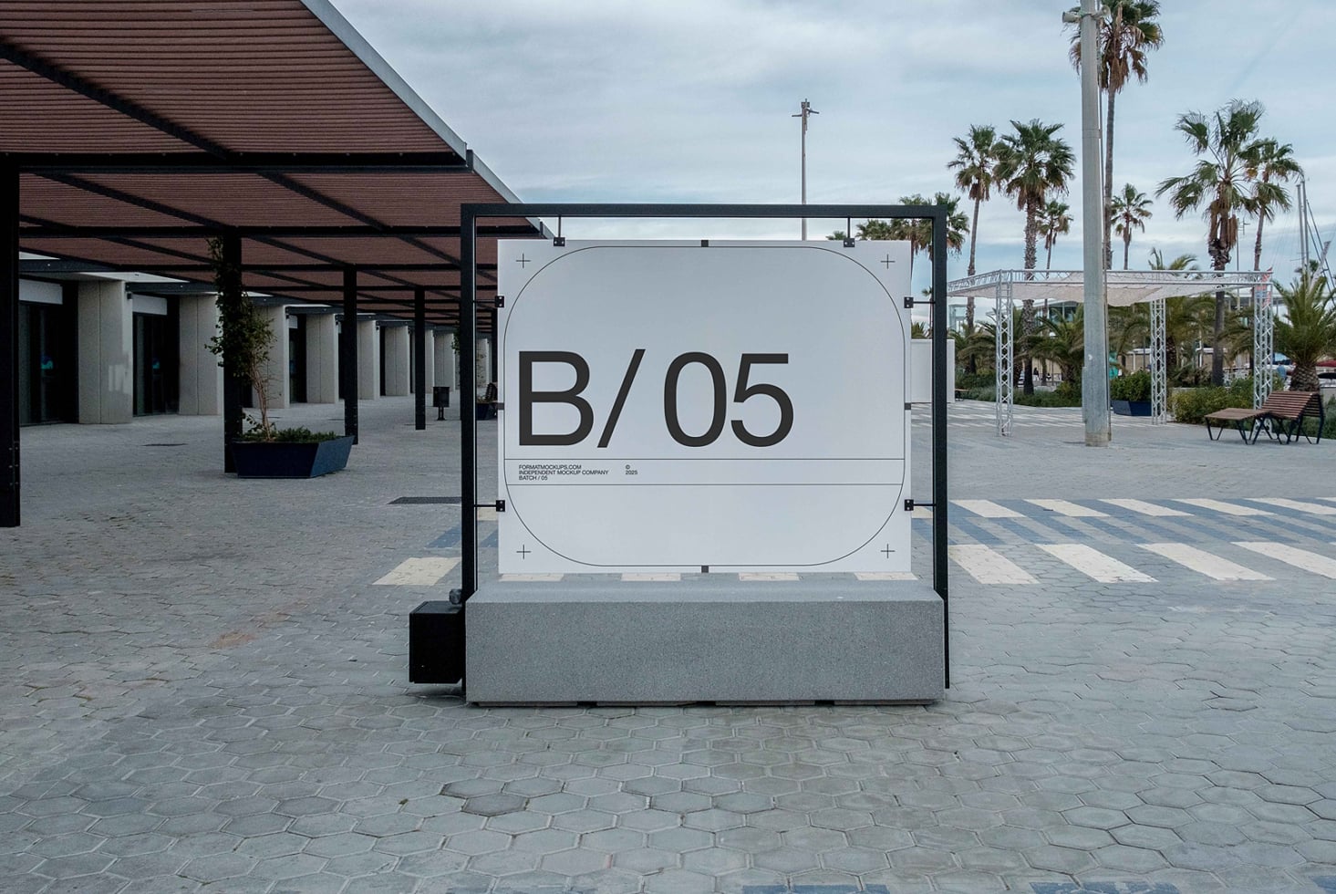 White outdoor billboard mockup on concrete plaza with palm trees in background