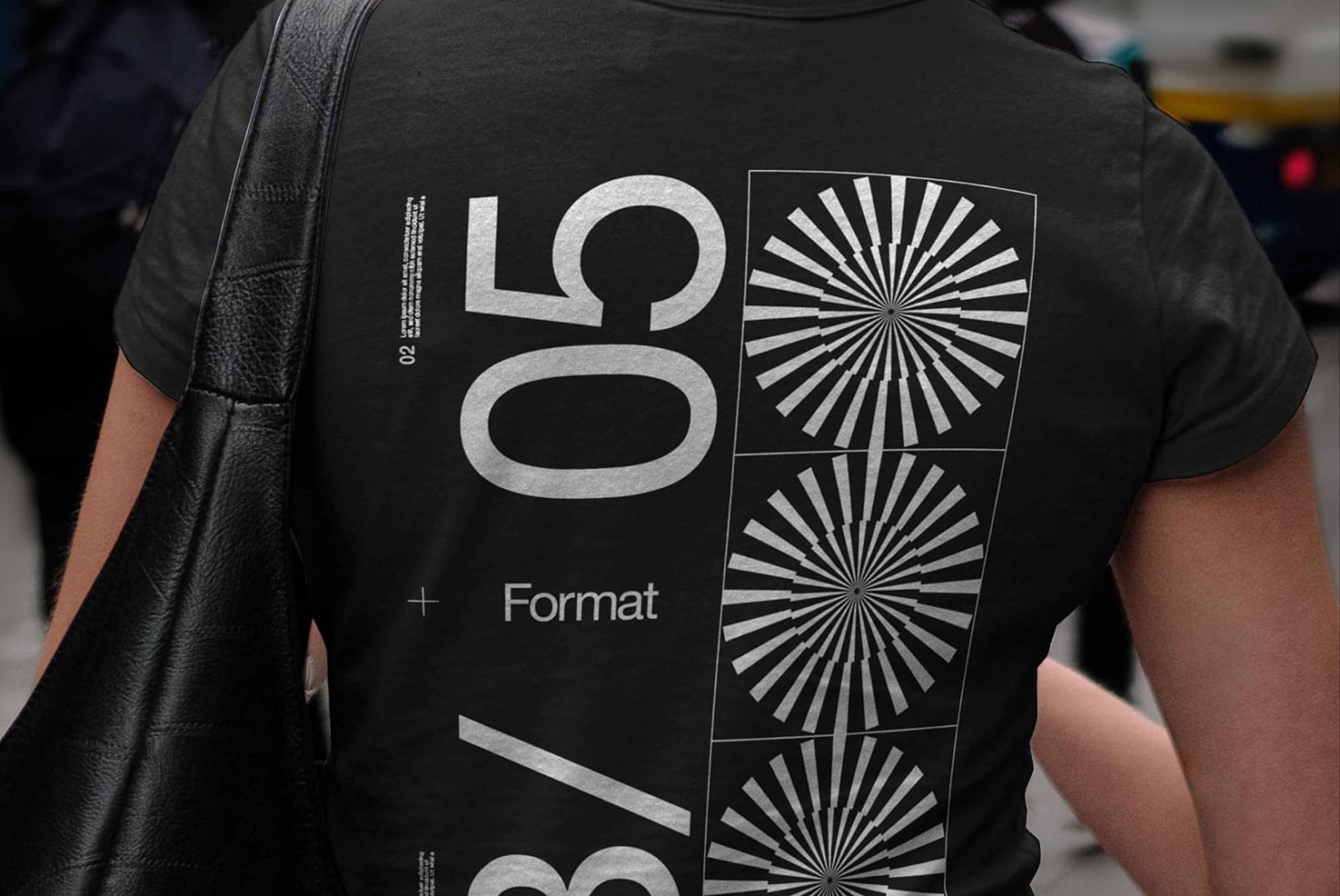 Dark t-shirt mockup with large numerals plus radial pattern squares