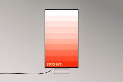 Desktop monitor showing gradient swatch palette from white to bright red