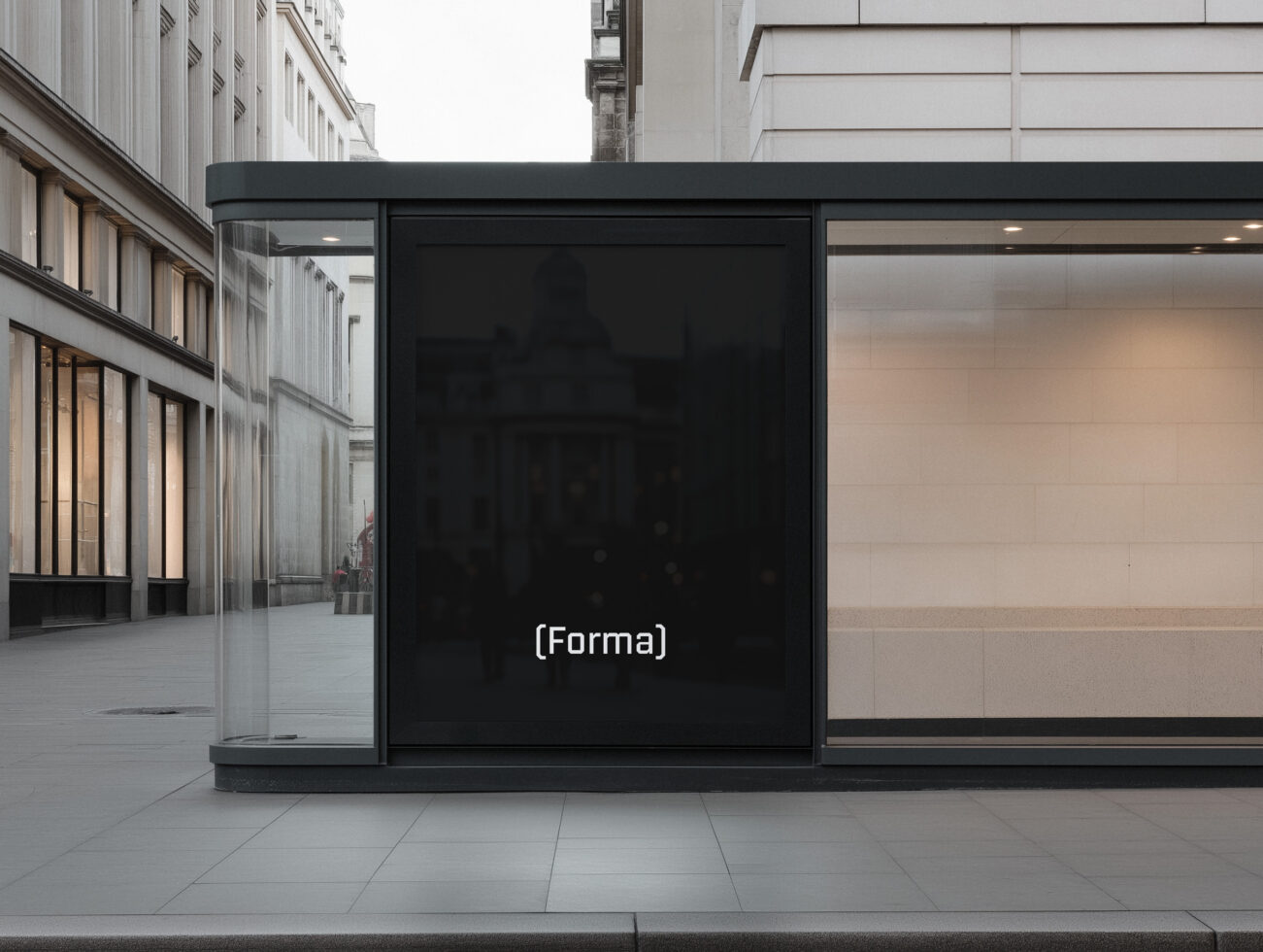 Black storefront display with blank screen on urban street corner