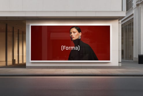 Wide horizontal billboard featuring woman in black on red background