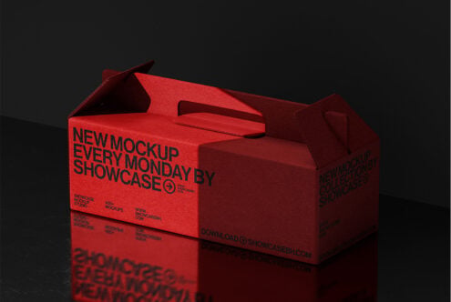 Bright red takeout box mockup with handle on dark surface