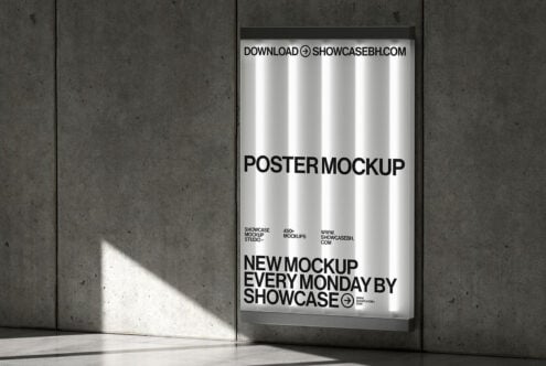 Framed poster mockup on concrete wall with natural light casting shadows