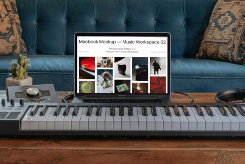 Macbook displaying music mockup positioned behind keyboard on table by couch