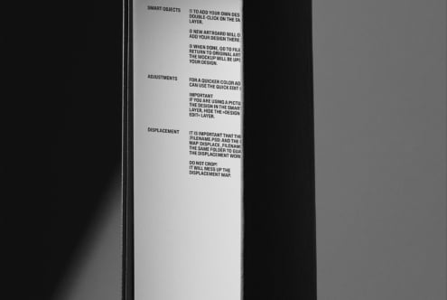 Black hardcover book spine detail showing printed instructions close up