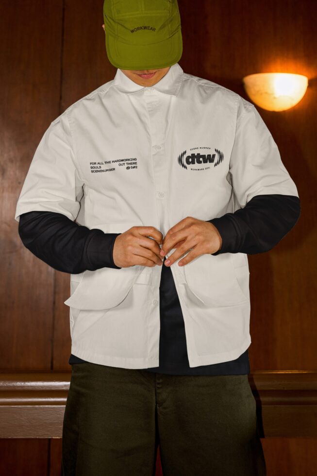 Lime cap styled with white shirt, black sleeves, featuring embroidered branding