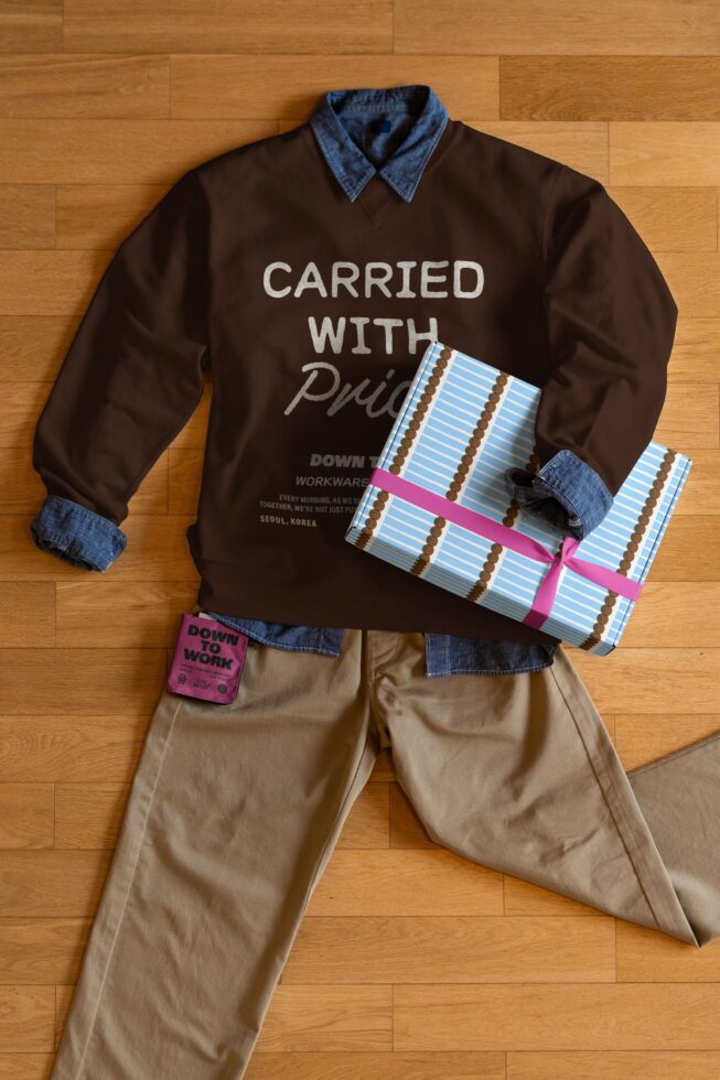 Dark sweatshirt with Carried with Pride text showing blue striped box mockup with pink ribbon