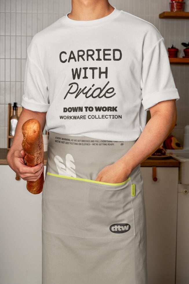 White t-shirt with Carried with Pride text mockup displaying neon yellow apron waistband trim