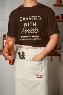 Brown t-shirt with Carried with Pride text mockup showing customizable tee apron design elements
