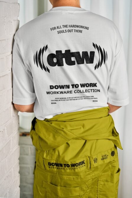Back of white tee with dtw logo, hardworking souls quote, lime cargo pants