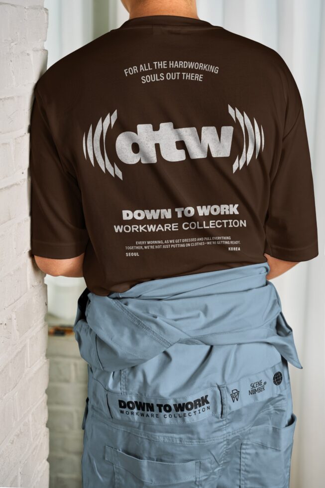 Back of brown crewneck with dtw logo, hardworking souls quote, light blue cargo pants