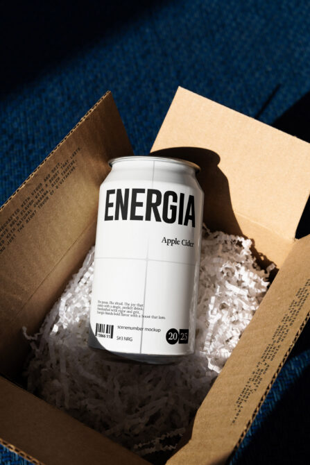 White Energia can unboxed from shipping box with kraft paper