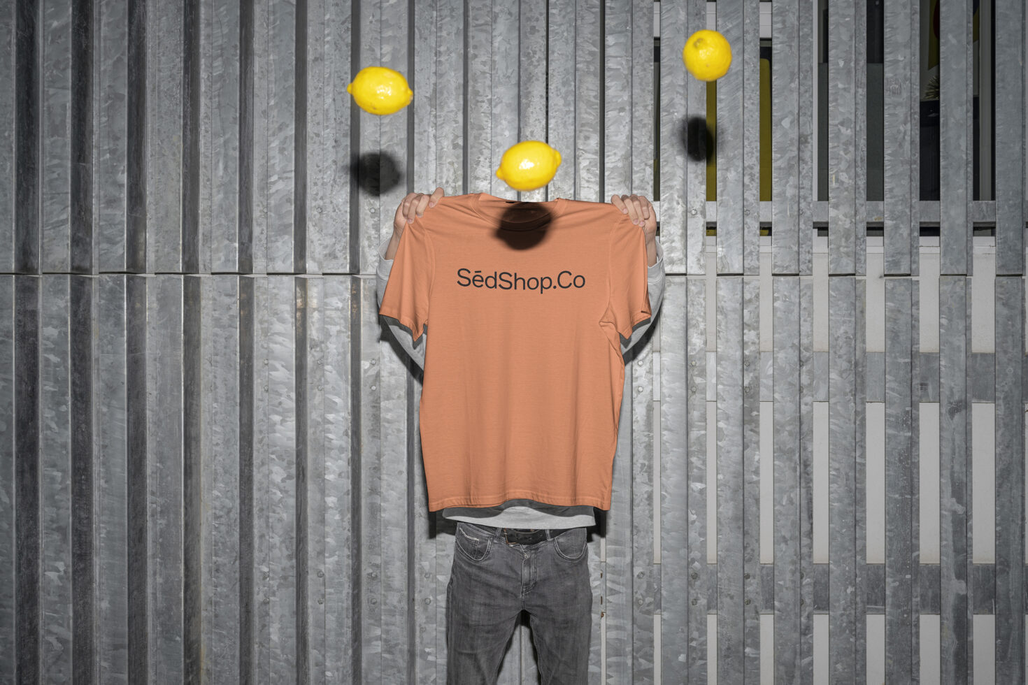 Peach t-shirt mockup with SedShop.Co text, figure with yellow lemons background