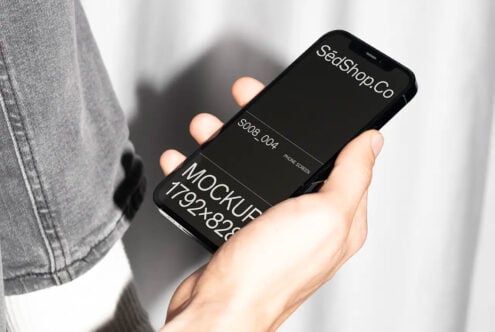 Black phone mockup in hand showing SeaShop.Co dark interface design