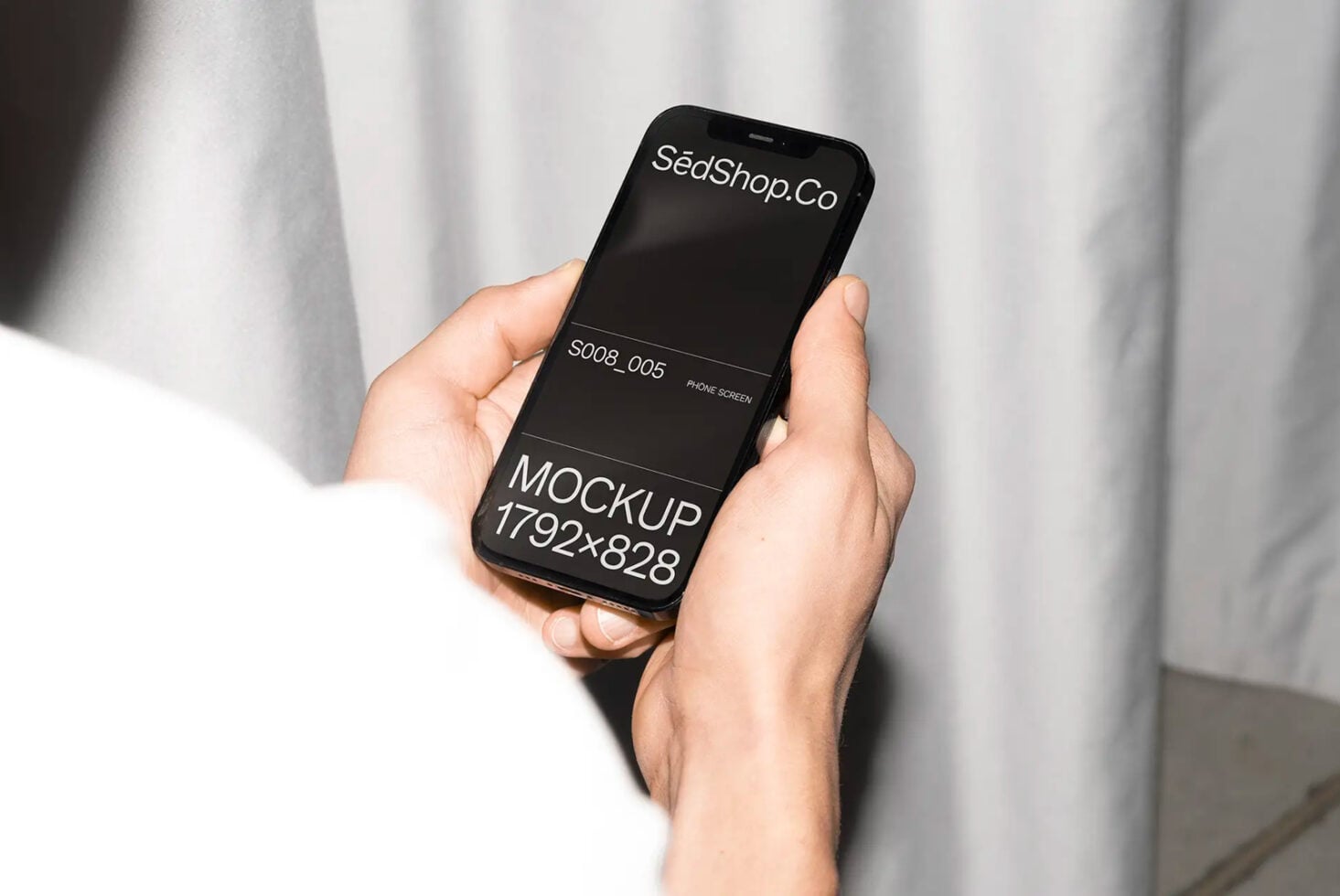 Black phone mockup displaying SeaShop.Co branding with dark screen layout