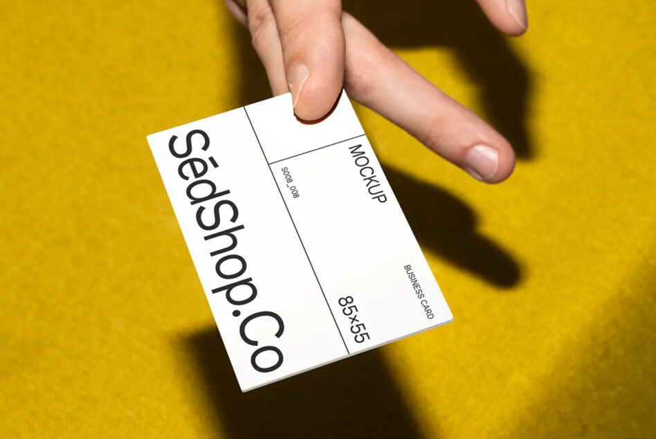 White folded business card mockup with vertical text layout showing SedShop.Co branding