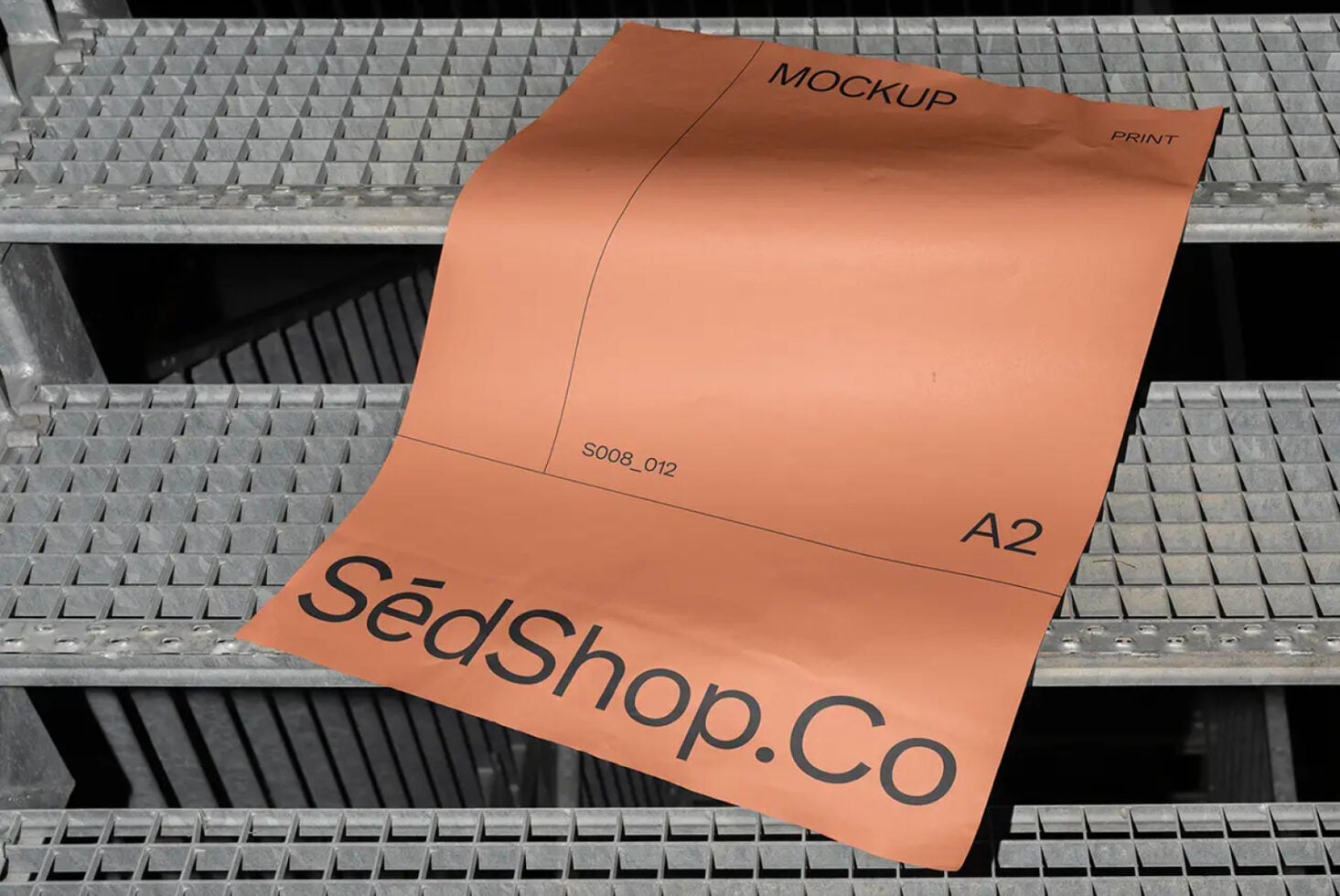 Orange A2 mockup with SedShop.Co branding on concrete grating surface