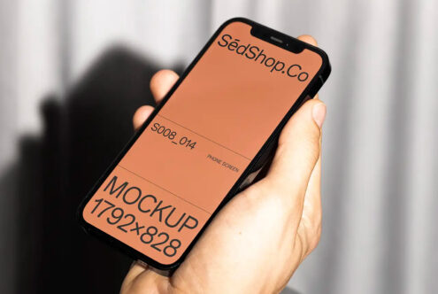Orange phone mockup in hand showing SédShop branding with warm tone display