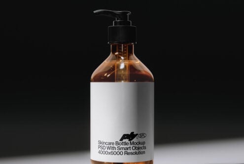 Amber glass pump bottle mockup with branded label showing smart objects