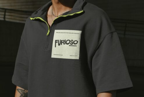 Black quarter zip pullover with label mockup worn by male model