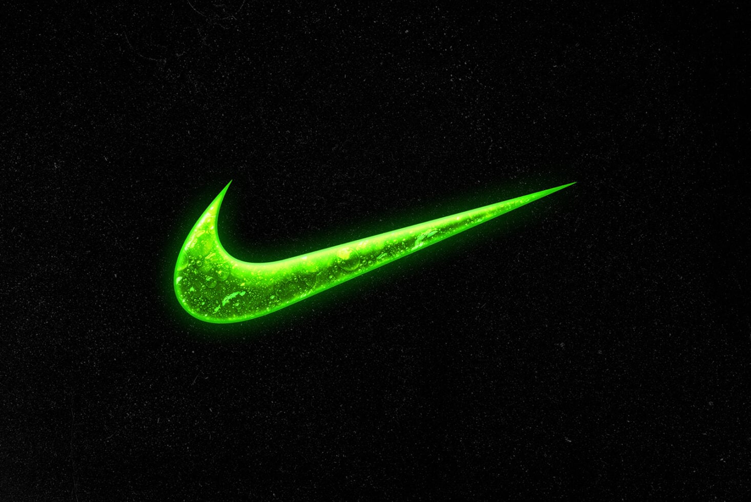 Bright neon green swoosh logo glowing against dark starry background