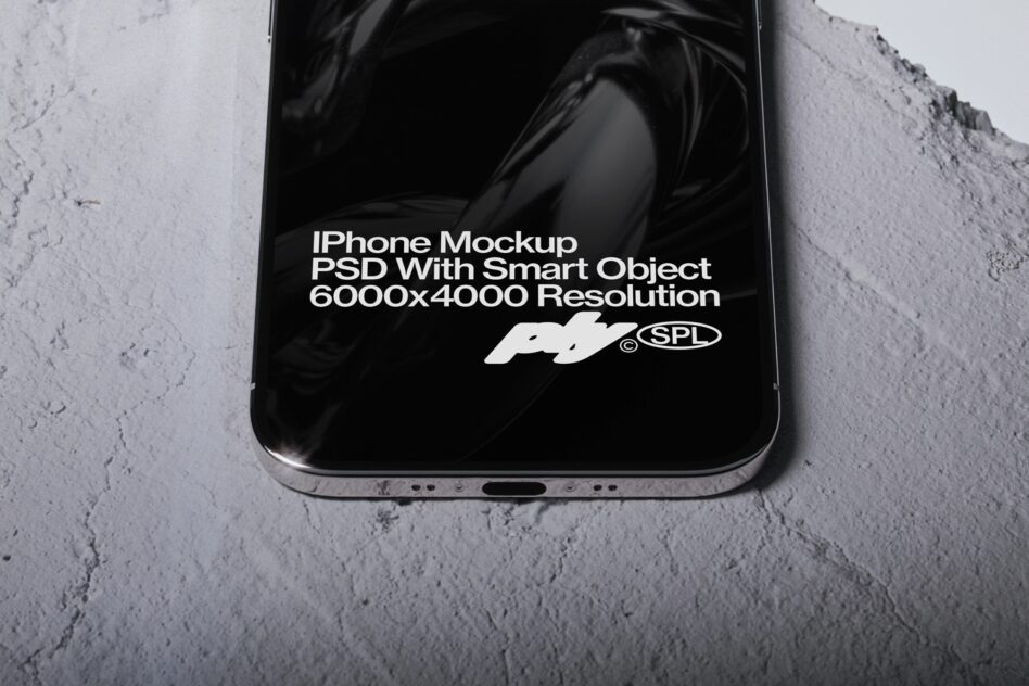 iPhone mockup with black screen on concrete ground surface
