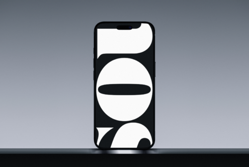 iPhone mockup with abstract black white shapes on display