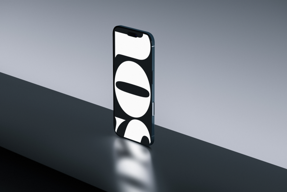 Smartphone displaying minimalist circular shapes on black background