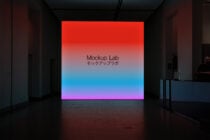 Large gallery screen with vibrant red to magenta gradient background