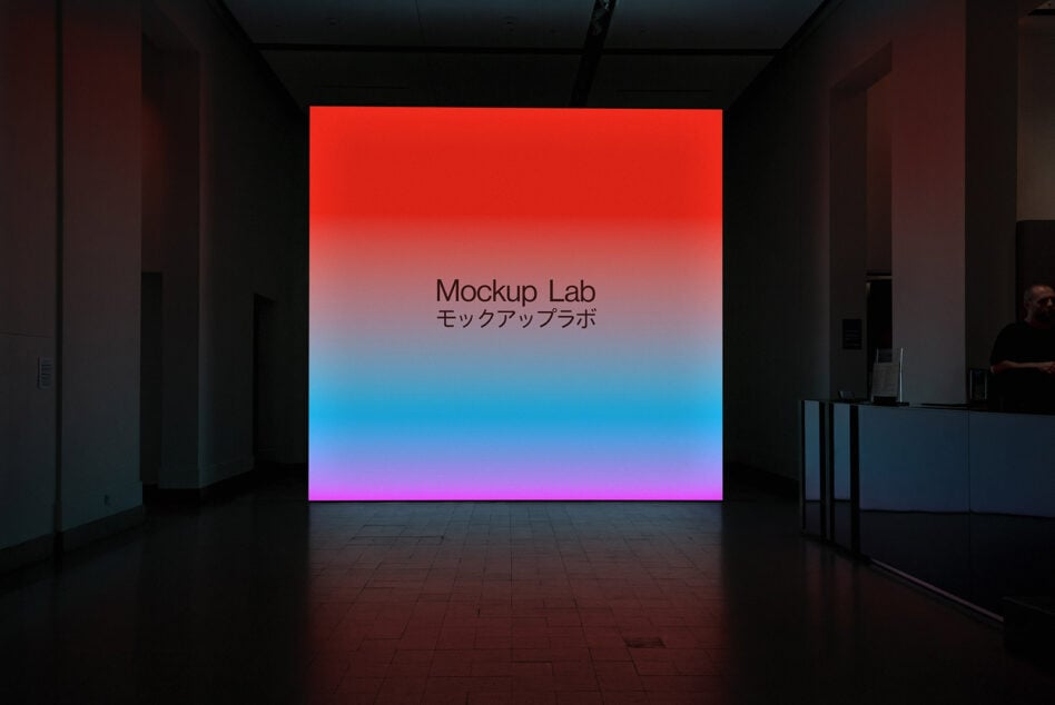 Large gallery screen with vibrant red to magenta gradient background