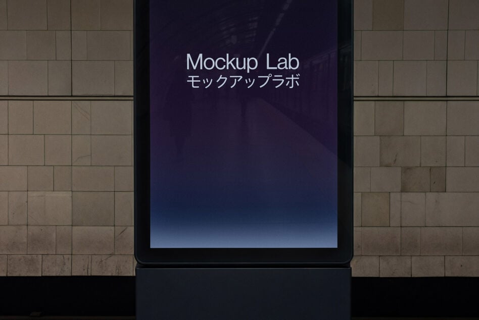 Dark tablet on textured wall displaying Mockup Lab with blue gradient background