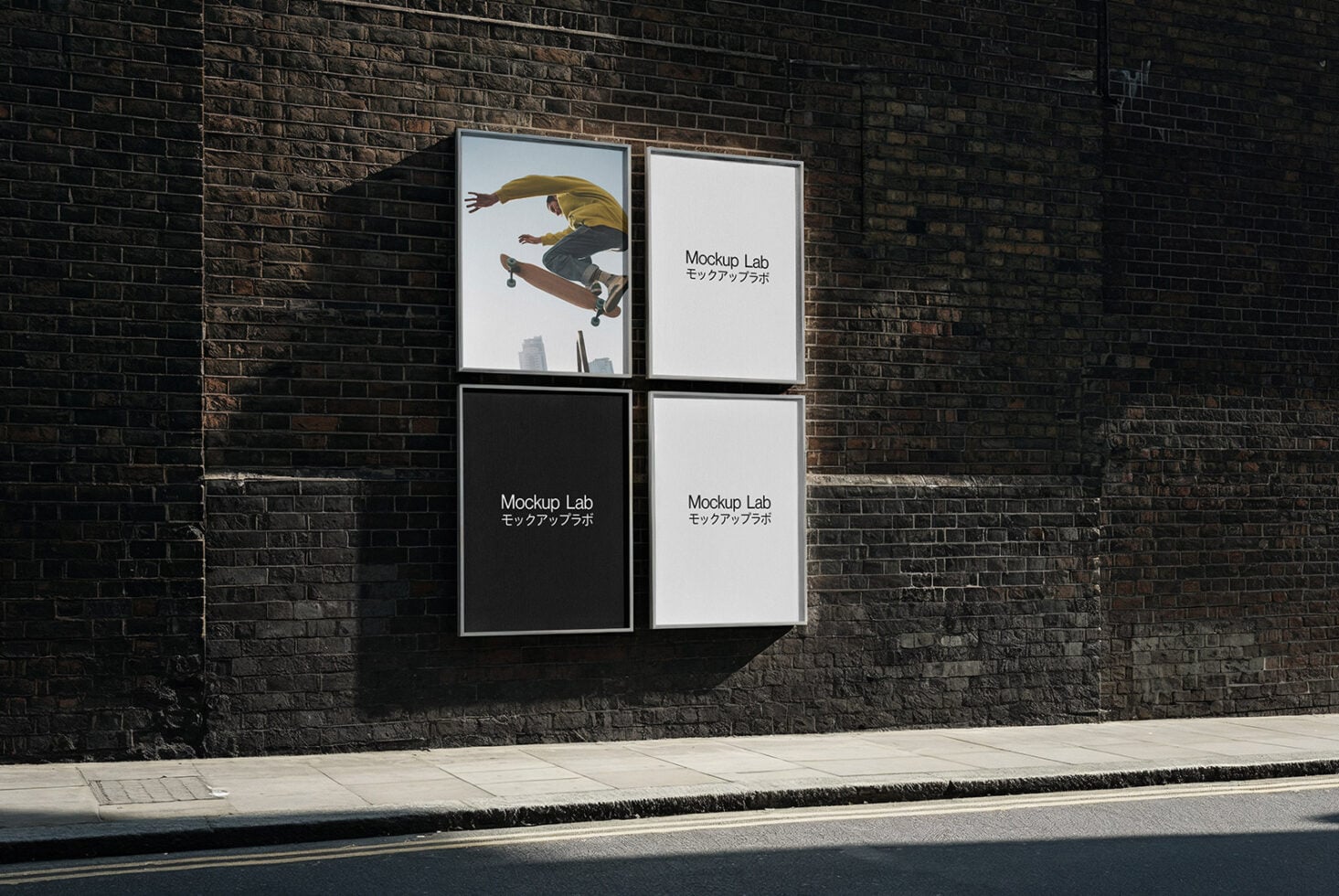 Four poster frames on industrial brick wall with skateboarder image visible