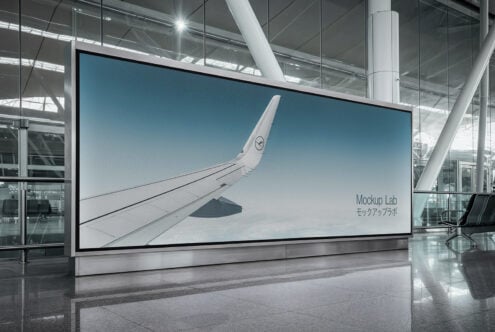 Large horizontal airport screen showing airplane wing photo with Mockup Lab