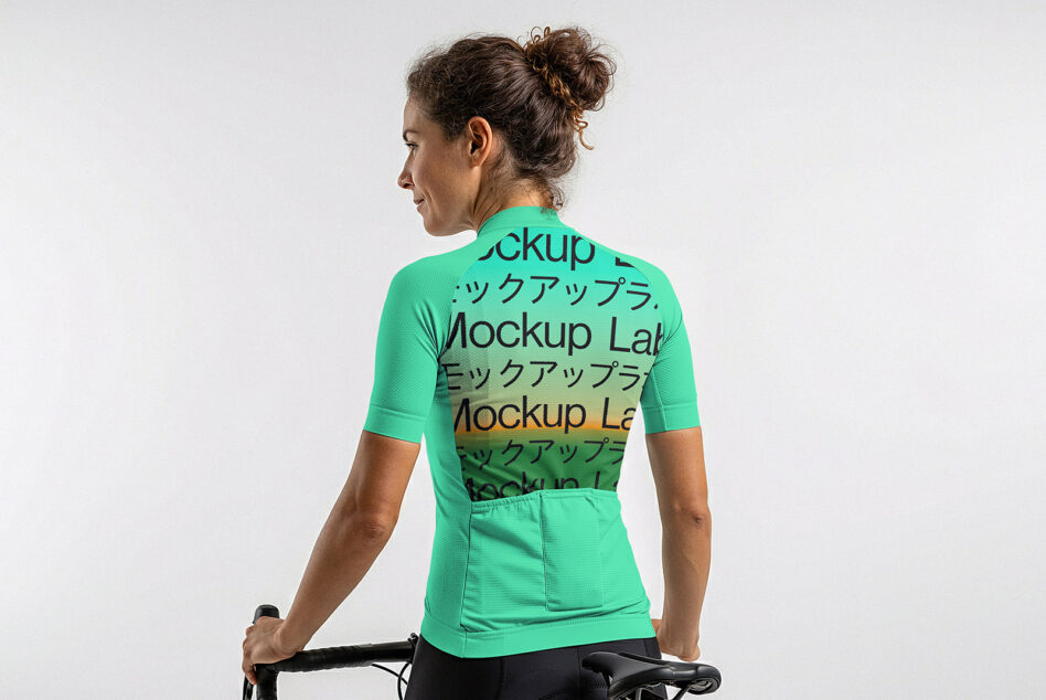 Female cyclist in bright green jersey mockup on stationary bike