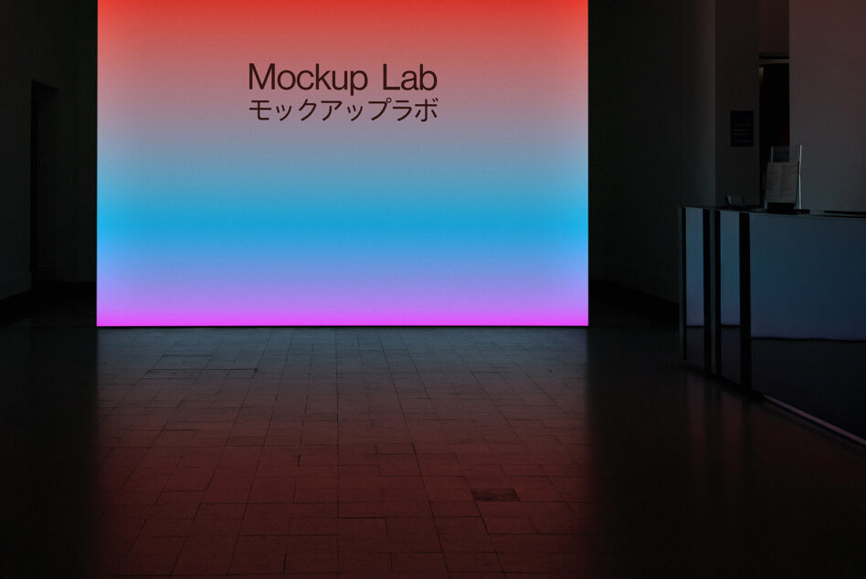 Gallery space with massive gradient wall transitioning from red to blue to magenta