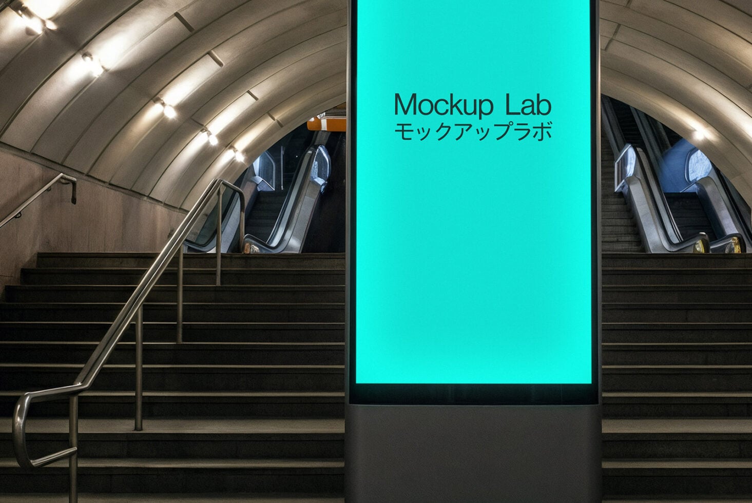 Bright cyan vertical display between subway stairs in transit station