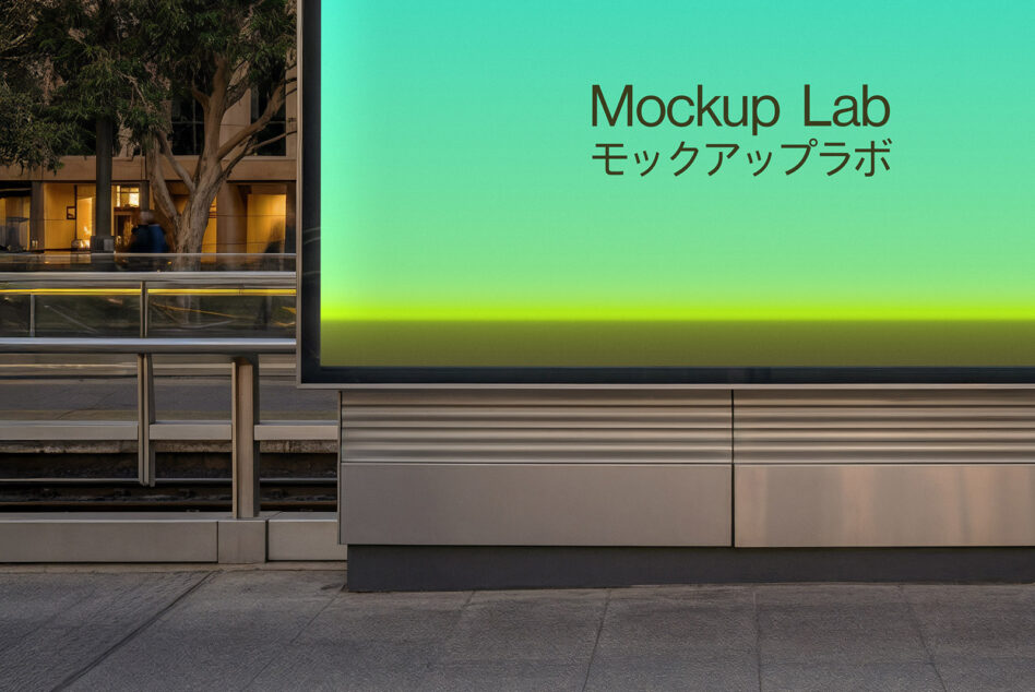 Turquoise to yellow gradient screen on urban storefront at street level