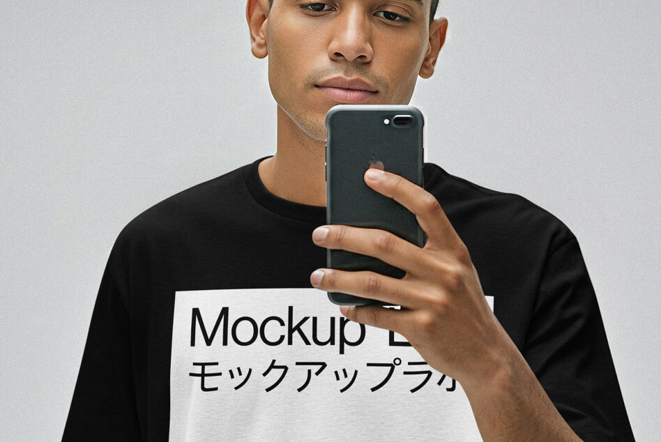 Guy holding dark smartphone mockup taking selfie portrait