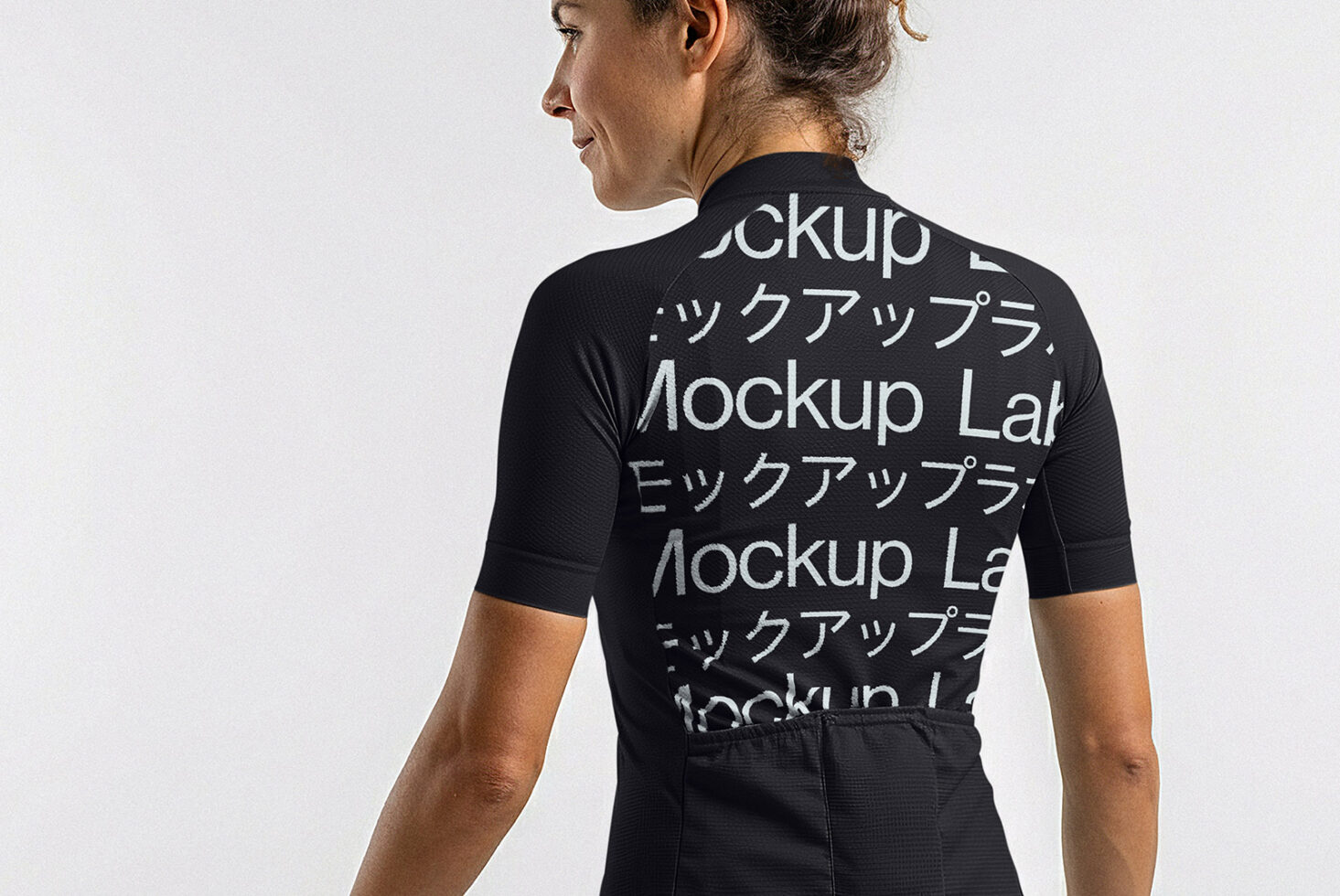 Woman wearing black cycling jersey mockup viewed from behind