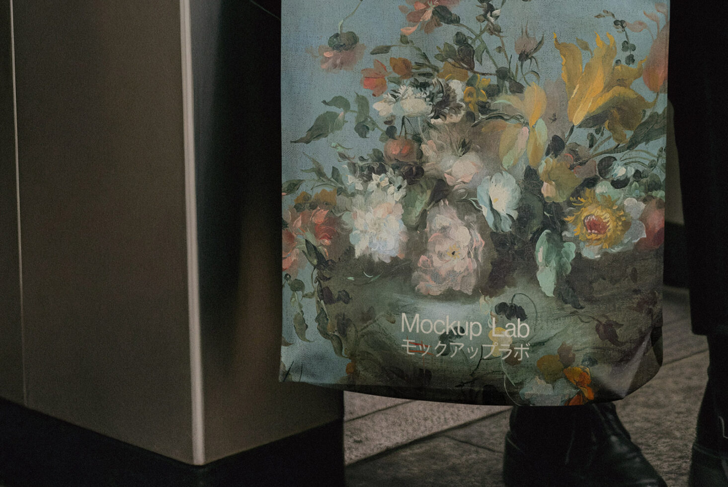 Hardcover book mockup with floral botanical artwork on spine, closed