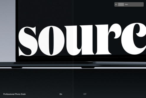 Laptop screen displaying large serif typography with grain texture effect