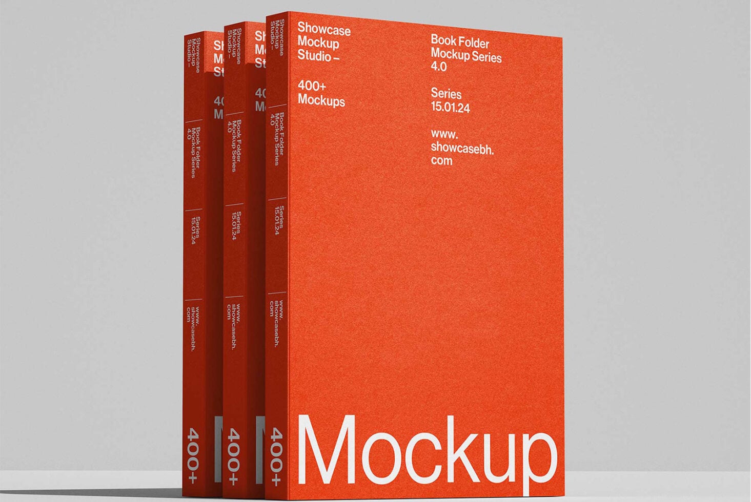 Four red book spines standing in row against light gray background mockup