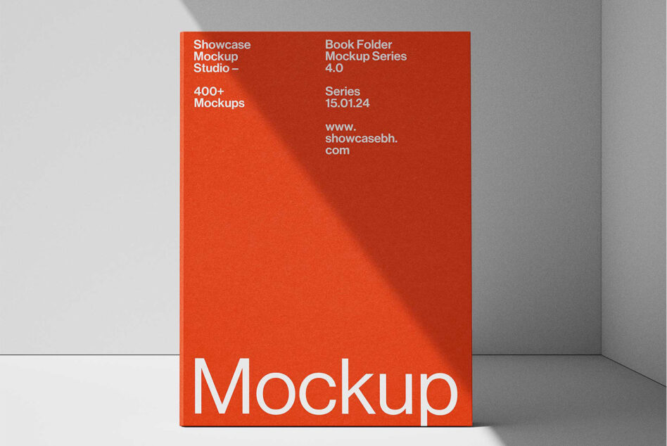 Red book displayed standing against neutral background with shadow