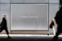 Empty street billboard on contemporary storefront with neutral tone